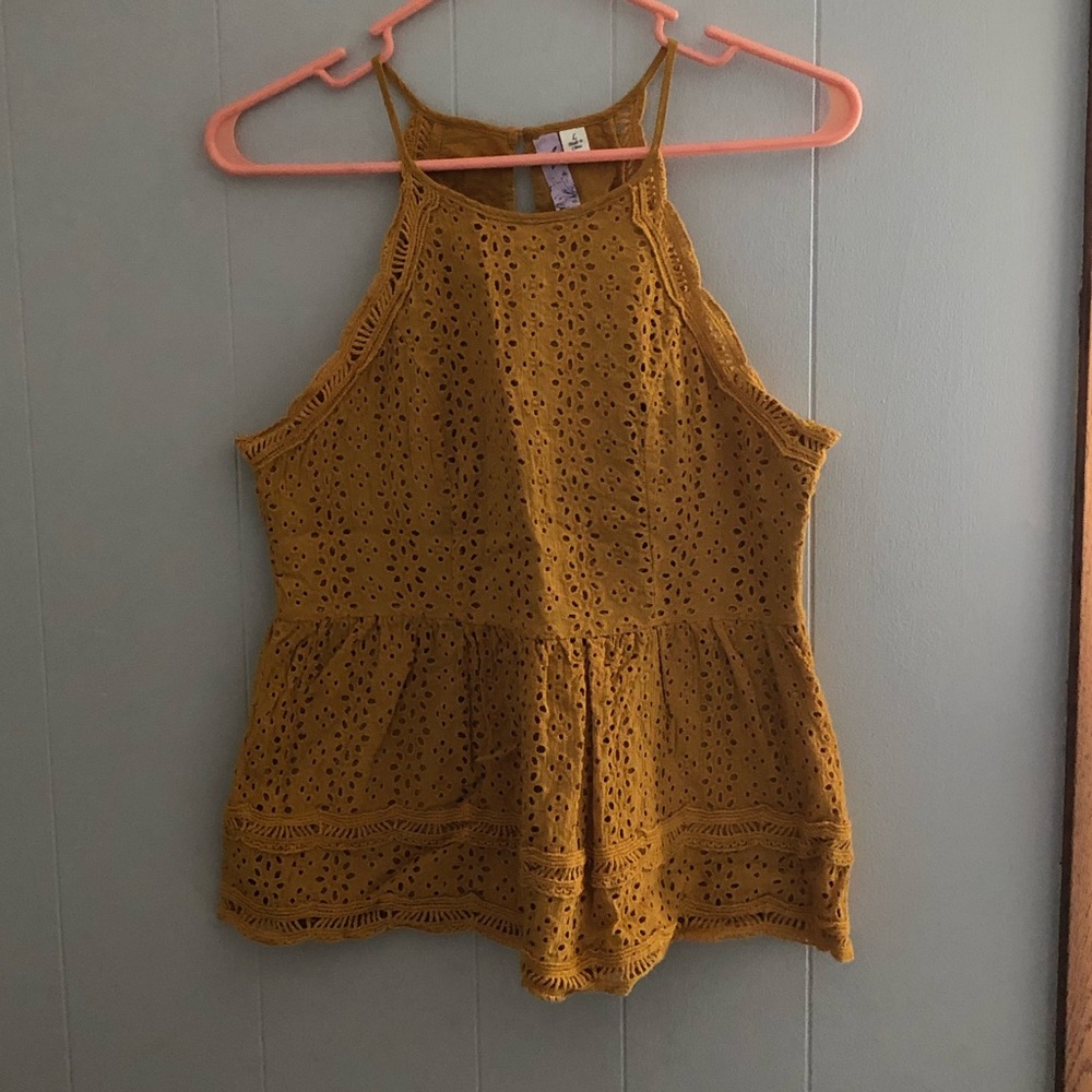 Eyelet peplum high neck tank